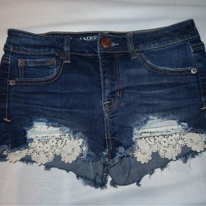 Lace detailed denim shorts